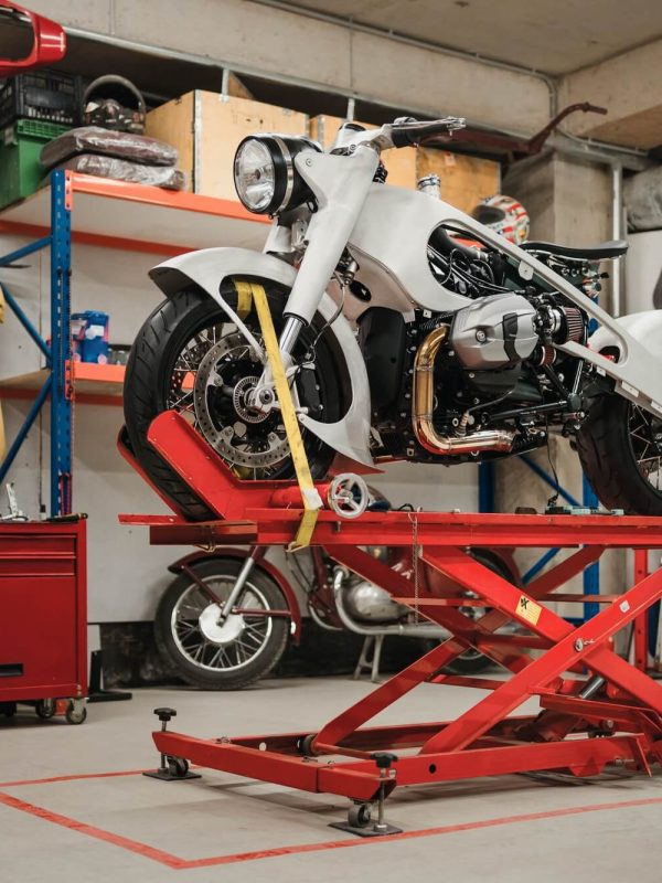 custom-motorcycle-standing-in-repair-shop-1.jpg