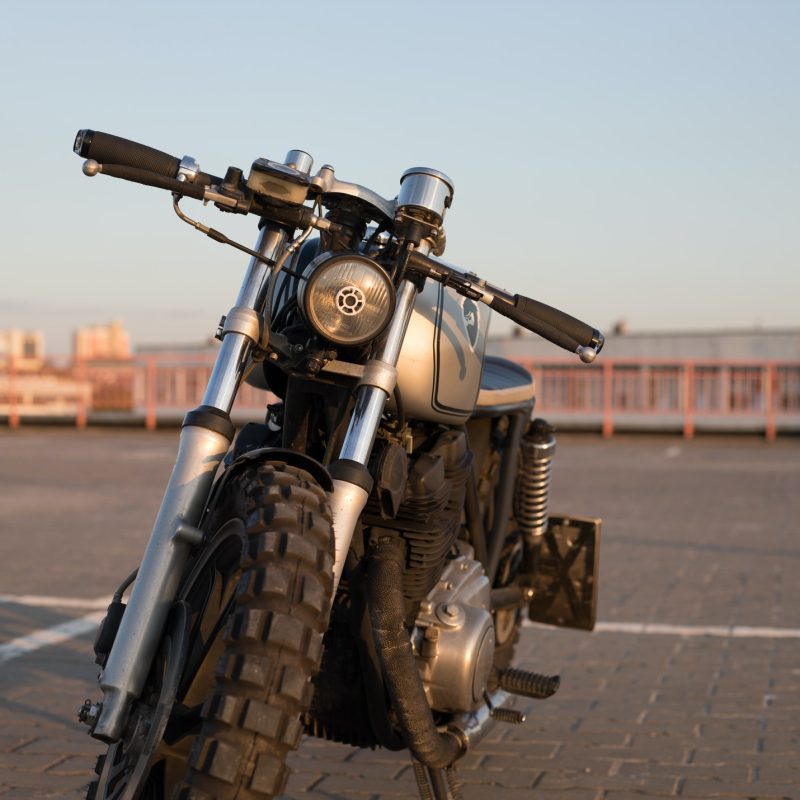 vintage-custom-motorcycle-on-parking-1.jpg